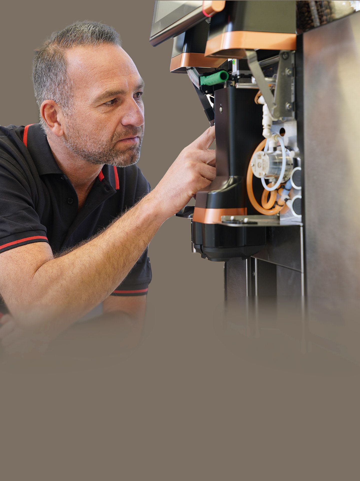 Service technician working at a coffee machine