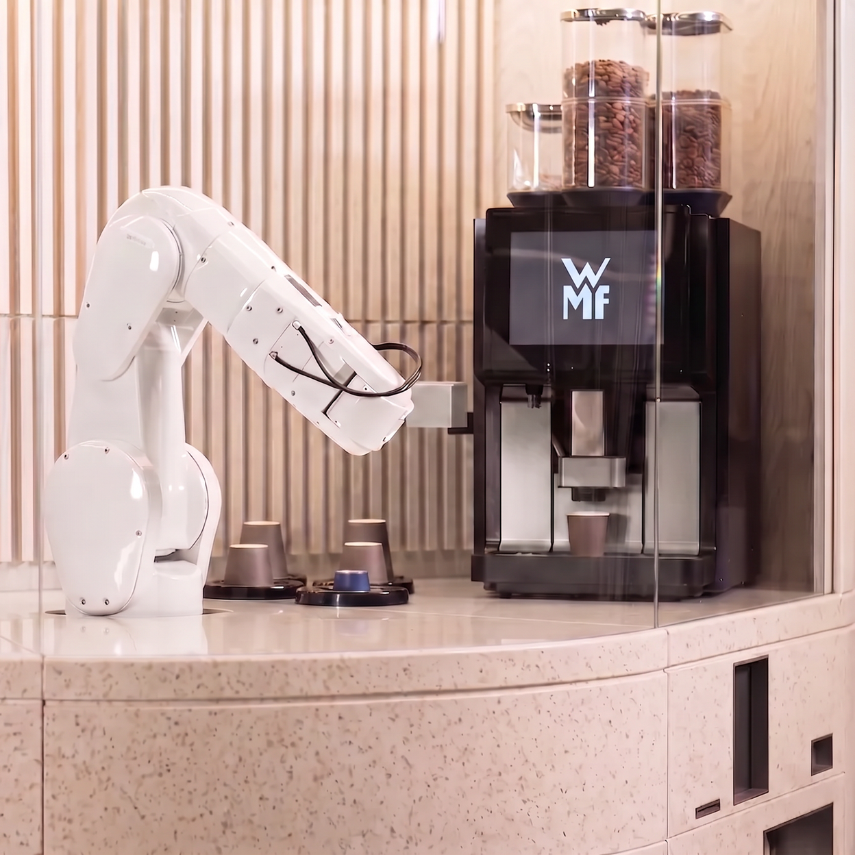 robot arm making coffee
