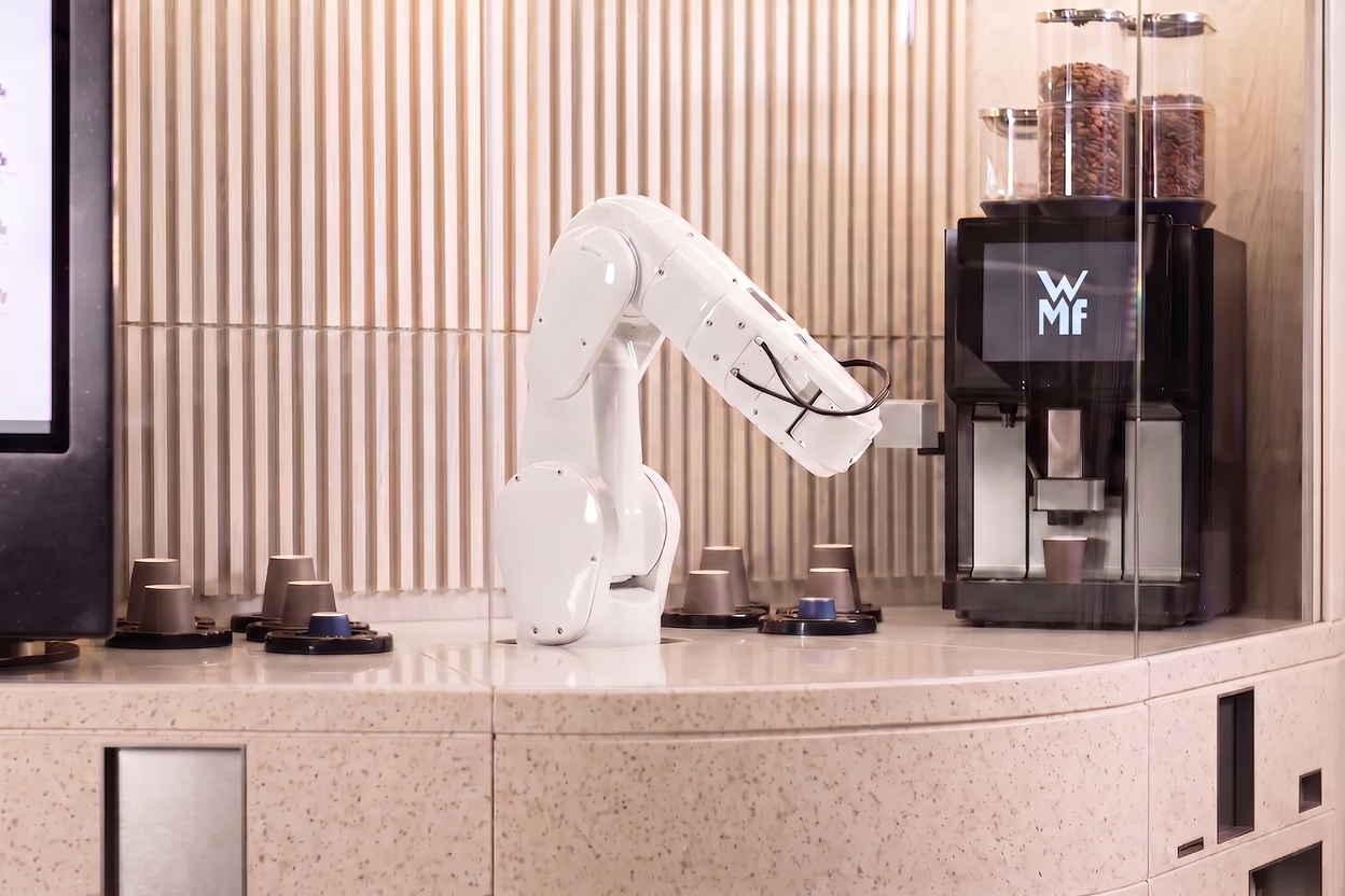 robot arm making coffee